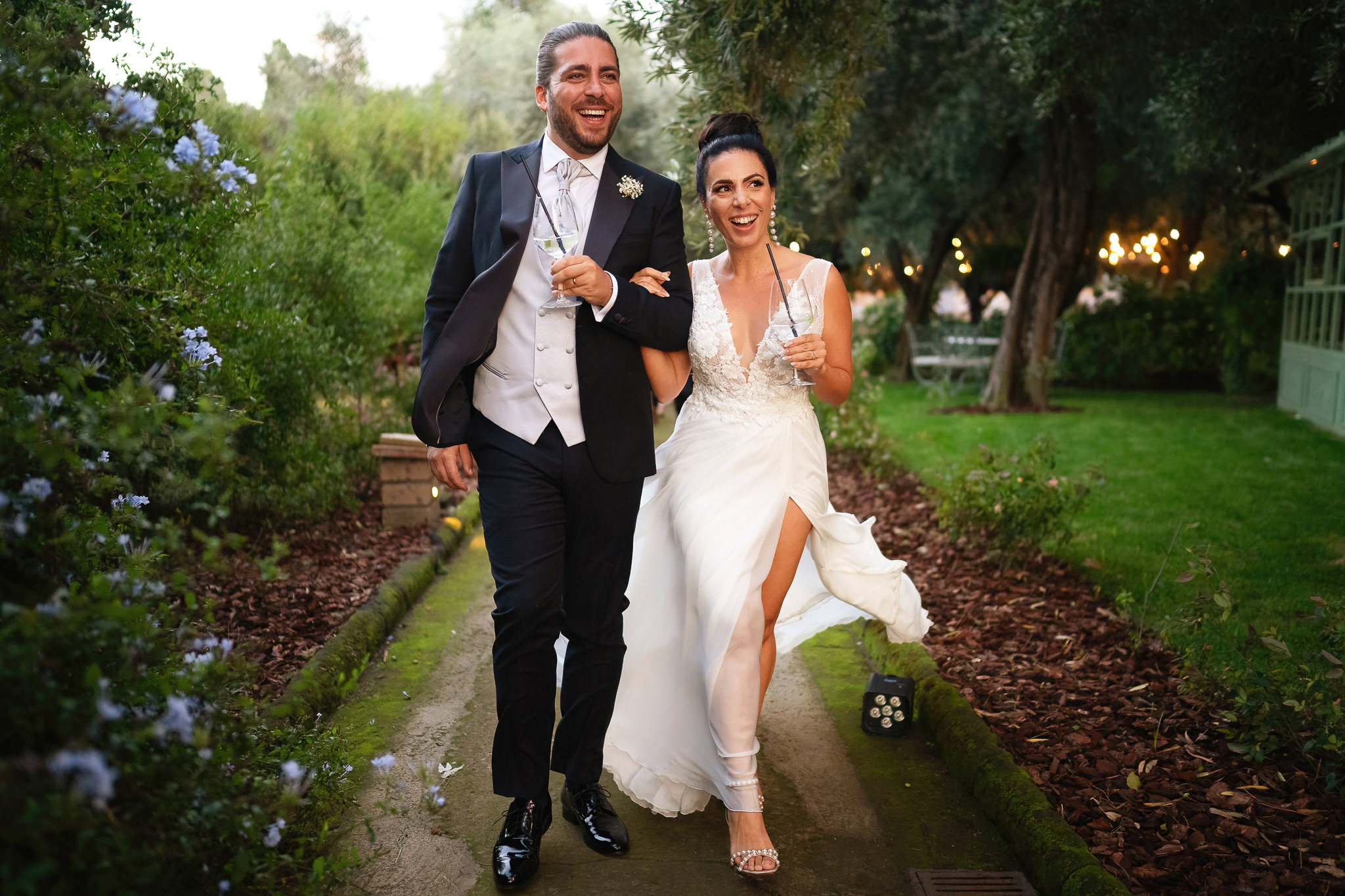 Bride and Groom walking in Villa Zagara to panoramic terrace